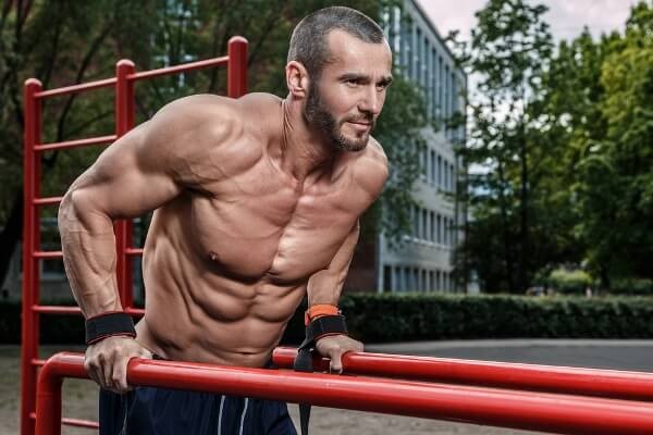 Wide Grip Chest Dip: Powerful Body Weight Chest Building Exercise